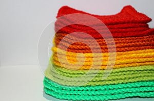 A pale of bright knitted elements