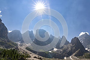 Pale di San Martino range panorama landscape during summer season. Passo Rolle summer landscape - Pale di San Martino range.