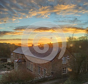 New Years Day wintry sunrise at English manorhouse in south Cornwall England photo