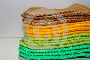 A pale of bright knitted elements