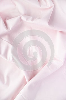 Pale pink crumpled linens. Place for your design, text, etc.