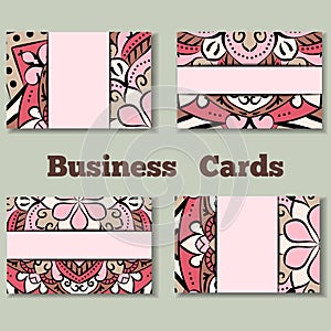 Pale pink template business cards with oriental pattern and geometric circle element.