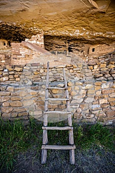 Pale Wooden Ladder Leans Against Wall In Mug House