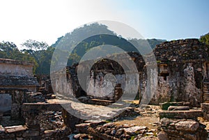 Palenque, Chiapas, Mexico: Archaeological site with mountains in the background. Landscape of the ancient city of Maya.