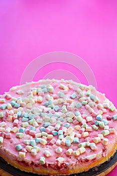 Paleo Cheesecake with Marshmallows for Party on Pink Background