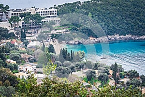 Paleokastritsa beach and village on Corfu Island, Greece. Seashore with turquoise crystal water. Agios Spiridon, beach