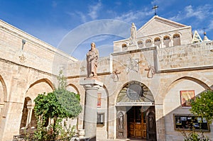 Saint Hieronymus statue at the Church of the Nativity of Jesus Christ on a sunny day. Palestine. Israel. The city of Bethlehem.