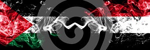 Palestine vs Yemen, Yemeni smoky mystic flags placed side by side. Thick colored silky smokes flag of Palestinians and Yemen,