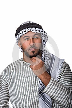 Palestinian Arab man in traditional costume and doing a thinking gesture photo
