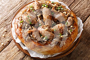 Palestinian musakhan or sumac chicken closeup on the table. horizontal