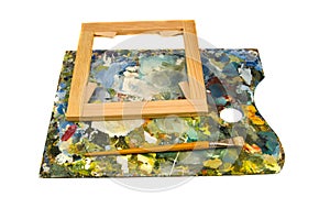 Palette with brush and canvas frame