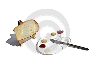 The palette includes mayonnaise, ketchup, mustard, jam and two types of jam with bread and a knife. Near an easel with bread
