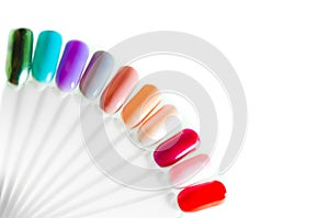 Palette with swatches of nail Polish. a collection of samples of varnish for manicure. well-groomed hands, healthy nails. Selectiv