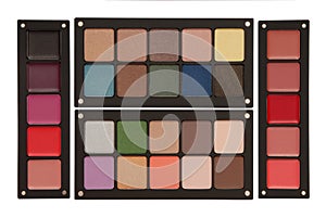 Palettes of lipstick, rouge, and eye shadow photo