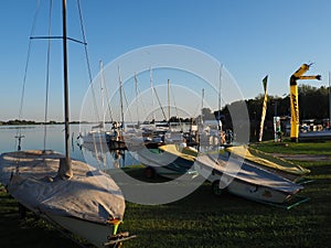 Palic, Serbia, September 11 2021 Boats and yachts on the shores of Lake Palic. Rest on the water. Sports water transport