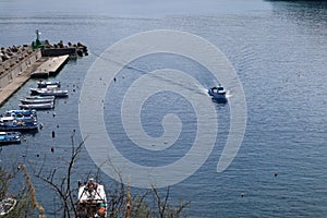 Palinuro - Barca in arrivo al porto photo