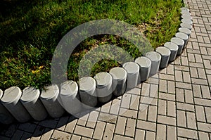 Palisade made of concrete of various shapes and profiles is widely used especially in garden architecture in solving smaller heigh