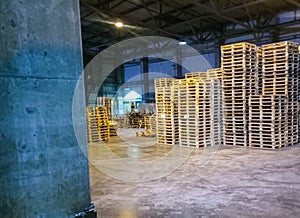 Pallet racks inside a cement plant. Loading shop of cement plant