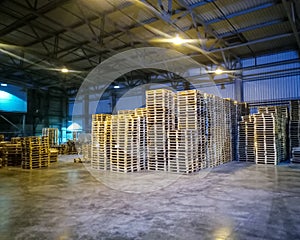 Pallet racks inside a cement plant. Loading shop of cement plant