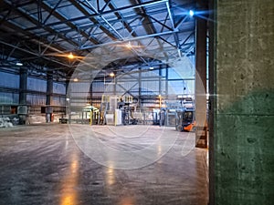 Pallet racks inside a cement plant. Loading shop of cement plant