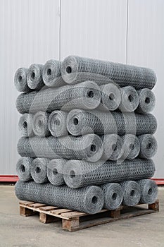 Pallet with rolls of metal wired mesh