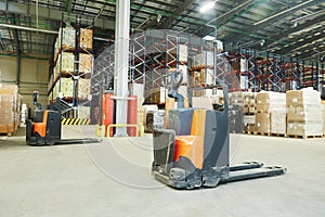 Pallet stacker truck at warehouse photo