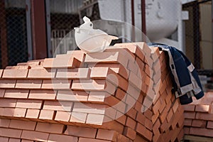 Pallets with building bricks. residential building construction and architecture