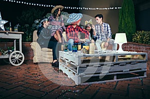 Pallets table with beverages and confetti in party