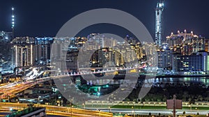 Palm Jumeirah Highway bridge aerial night timelapse. Dubai, United Arab Emirates