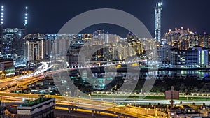 Palm Jumeirah Highway bridge aerial night timelapse. Dubai, United Arab Emirates