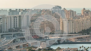 Palm Jumeirah Highway bridge aerial timelapse. Dubai, United Arab Emirates