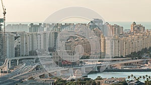 Palm Jumeirah Highway bridge aerial timelapse. Dubai, United Arab Emirates