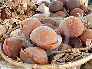 Palm sugar in the basket for sale in the market
