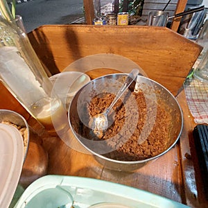 palm sugar that has been mashed for sweetening Indonesian herbal drinks