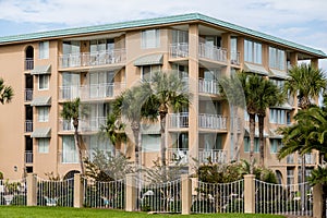 Palm Trees Around Tropical Stucco Condos