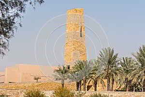Palm trees and buildings of Diraiyah, also as Dereyeh and Dariyya, a town in Riyadh, Saudi Arabia, was the original home of the photo