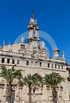 Palm trees in front of the Santos Juanes church in Valencia