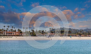 Palm Trees and Resort on Santa Barbara Beach at Dawn