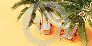 Palm trees, sun loungers and a beach umbrella on a yellow background. View from above.