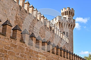 Palma de Mallorca, Spain - 7 Nov, 2022: Towers and outer walls of the Royal Palace of La Almudaina