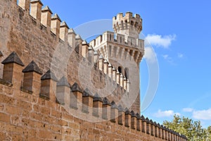 Palma de Mallorca, Spain - 7 Nov, 2022: Towers and outer walls of the Royal Palace of La Almudaina