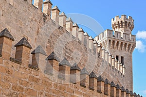 Palma de Mallorca, Spain - 7 Nov, 2022: Towers and outer walls of the Royal Palace of La Almudaina
