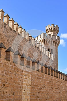 Palma de Mallorca, Spain - 7 Nov, 2022: Towers and outer walls of the Royal Palace of La Almudaina