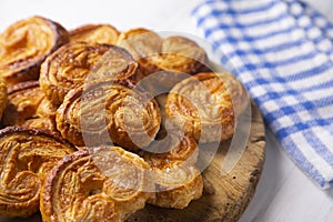 Puff pastry glasses or palmeritas made with baked sugar. photo