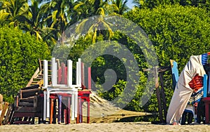 Palms parasols sun loungers beach resort Zicatela Puerto Escondido Mexico
