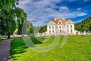 Palmse, Estonia - July 14, 2017: Palmse Manor and surrounding meadows in summer season