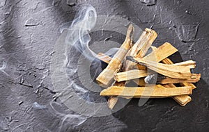 Palo santo - Bursera graveolens. Dark background