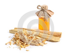 Palo santo, Holy Wood sticks with essential oil. Isolated on white background. photo