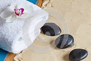 Pampering therapy at the beach with hot stone massage