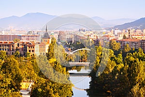 Pamplona with bridge over river photo